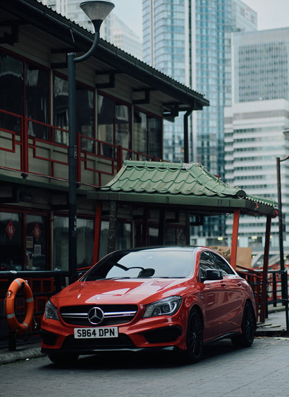 This Red Mercedes photographed at Canary Wharf in London in January 2024 is sure to turn heads. With its sleek design and stunning backdrop, this street photography captures the essence of luxury and style. Experience the beauty of this iconic car and its surroundings with this one-of-a-kind piece.