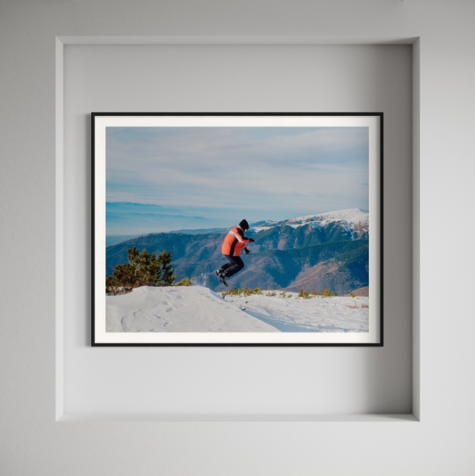 Boy Jumps in Snow