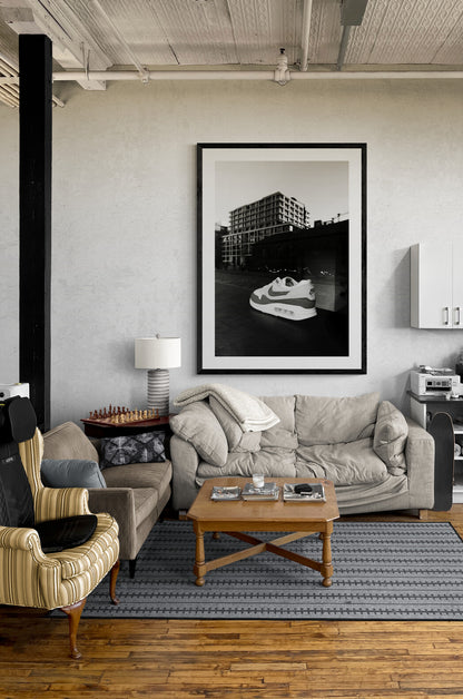 Spice up your space with a combination of monochrome retro vibes with a modern floating sneaker superimposed over what looks like an industrial street but it's actually Coal Drops Yard, next to King's Cross, London. The perfect gift for a steaker-head or fashion fanatics. Printed on Hahnemühle Pearl for maximum contrast and stunning clarity. Photograph made April 2023